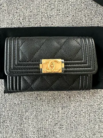 Chanel black leboy wallet brand new with receipt.