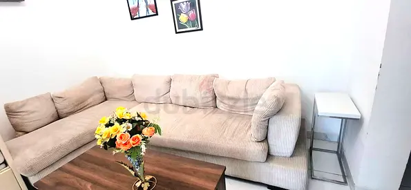 Light beige L-shaped sofa - comfortable 3-seater with chaise-5 person seating-HOME CENTRE Product