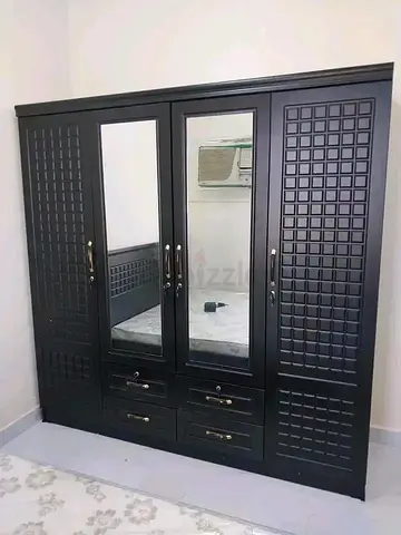 Brand new 4door cabinet dark brown colour