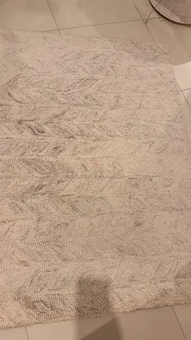Light beige textured area rug - 160x230 cm (approx) in good condition