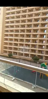 Furnished Studio | Balcony | Pool & Amenities View