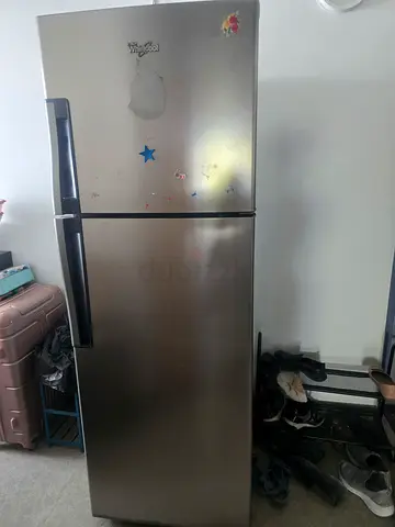 Used top-freezer stainless steel refrigerator - good working condition