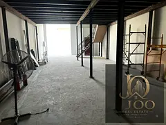 Location: Al Jurf Industrial Area. Warehouse area: 2,300 sq. ft. Mezzanine providing additional usab