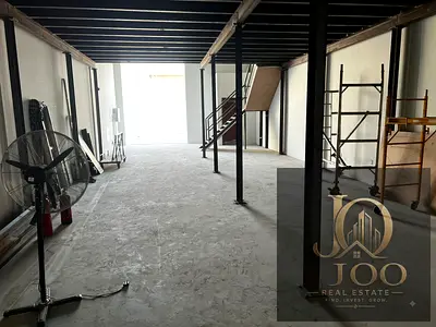 Location: Al Jurf Industrial Area. Warehouse area: 2,300 sq. ft. Mezzanine providing additional usable space. Suitable for warehousing, storage, works