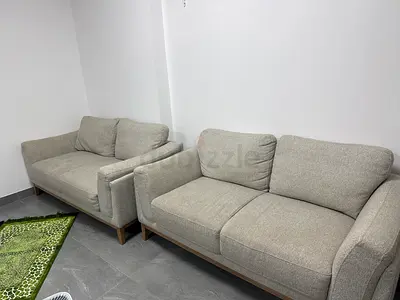 2 light grey 2-seater sofa in good condition