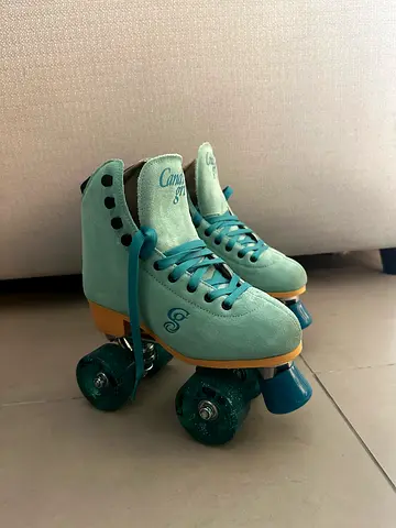 Light teal suede quad roller skates - good condition, size 9 women’s