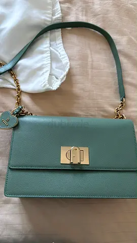 Mint green leather shoulder bag with gold chain strap