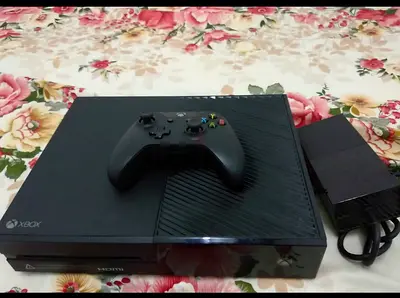 Xbox one 500 go + controller + Games extra