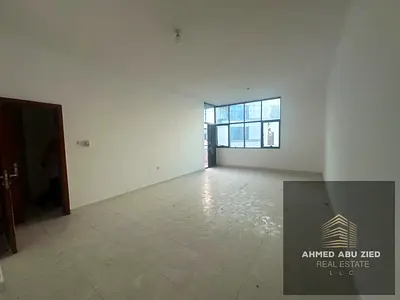 Two master bedrooms, large living area, built-in wardrobes, balcony with an open view, parking, cen