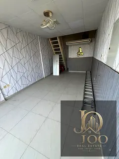 Commercial Shop with Mezzanine for Rent in Al Rawda 3 | Main Road | Next to Al Shorouq Mall