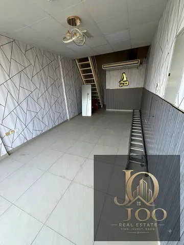 Commercial Shop with Mezzanine for Rent in Al Rawda 3 | Main Road | Next to Al Shorouq Mall