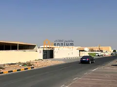 Industrial property for sale in Al Sajaa, prime location, with rental income.