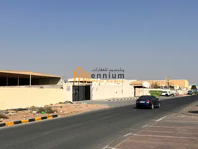 Industrial property for sale in Al Sajaa, prime location, with rental income.