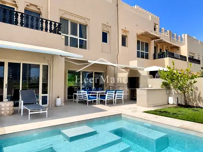 UPGRADED TOWNHOUSE WITH POOL AND GOLF COURSE VIEWS