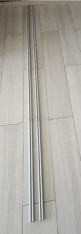 Two 2.5-meter metal curtain rod for sale.
