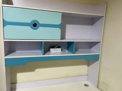 White and light blue study desk with shelf with storage in Al-mushrif area