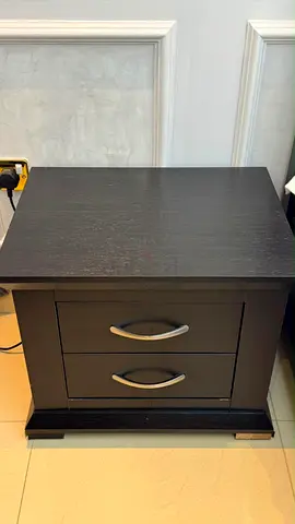 Dark wood bedside table with two drawers, good condition