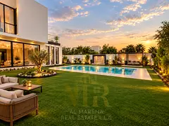 Villa in Al Zorah Golf Community, Ajman; includes electricity, water, and air conditioning. Freehold
