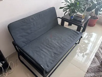 Compact IKEA black metal futon sofa bed - used sparingly - good condition