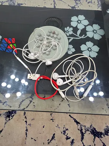 Bundle of used wired earphones and headset accessories