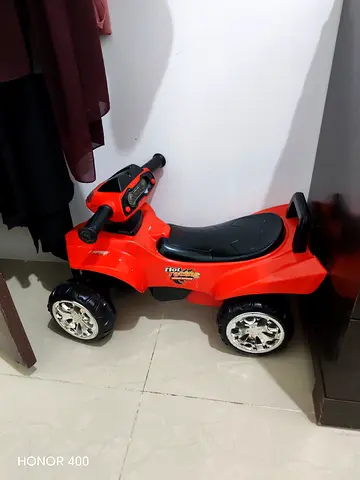 Red Ride-On Toy Car for Toddlers - Good Condition