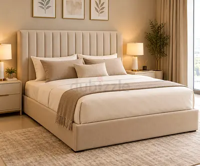 Beige upholstered king bed frame with tall channel-tufted headboard
