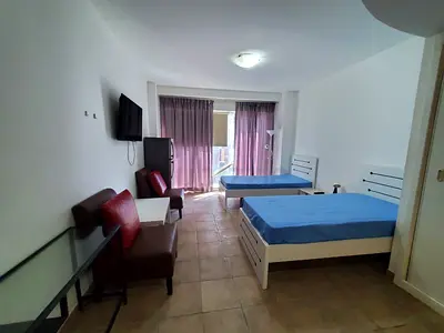 Luxury Fully Furnished Room in UP Tower – Opposite Metro | Executive Ladies & Couples Only
