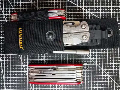 Leatherman Charge TTI New Bit Extender&Bits & Victorinox Swiss Champ+Free Delivery to All UAE+COD
