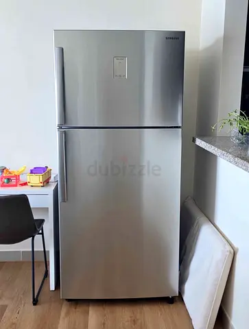 Samsung refrigerator 720 liter capacity top mount freezer tatest model same like a new condition