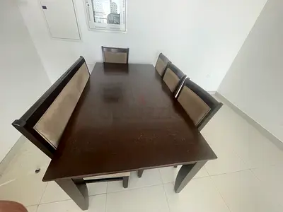 Dark Wood Dining Table with Upholstered Chairs and Bench