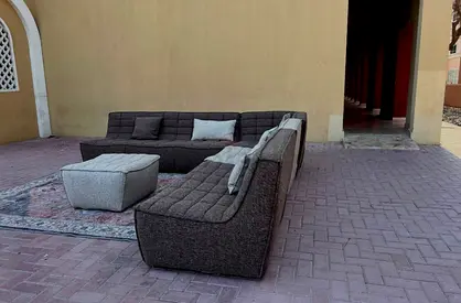Al Huzaifa Corner feather filled L Shape Sofa with footstools
