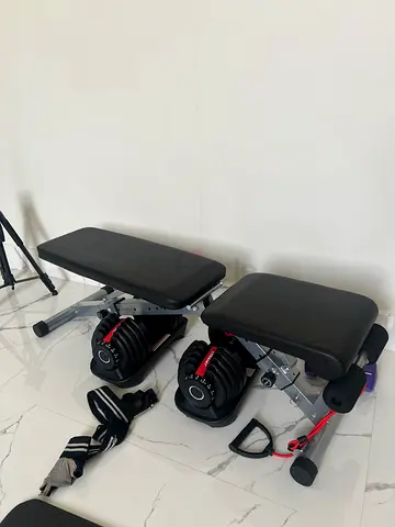 Adjustable workout bench with resistance bands - good condition