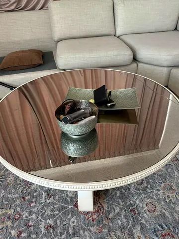 Gold metal decorative side table with matching decor (used)