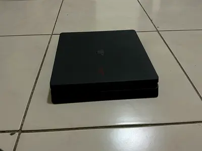 PS4 with games and controller
