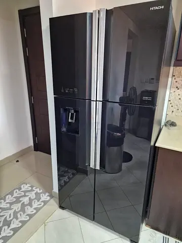 Hitachi 4-Door Black Glass Side-by-Side Refrigerator with Water Dispenser