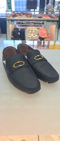 Black leather men's loafers with gold buckle - gently used