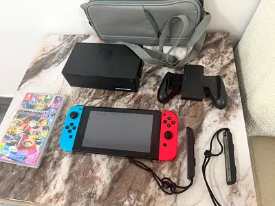Nintendo Switch Console with Dock, Joy-Cons, Mario Kart and Carry Bag - Good Condition