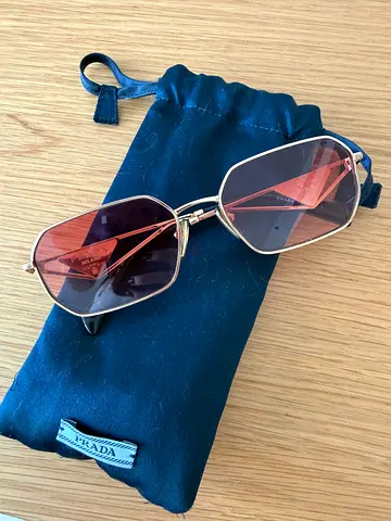 PRADA Sunglasses with Pink Lenses