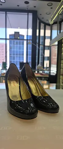 Black patent leather high heels - size unknown, gently used