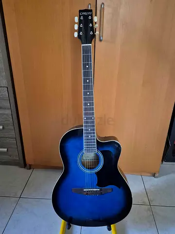 Blue acoustic guitar - good condition, light wear