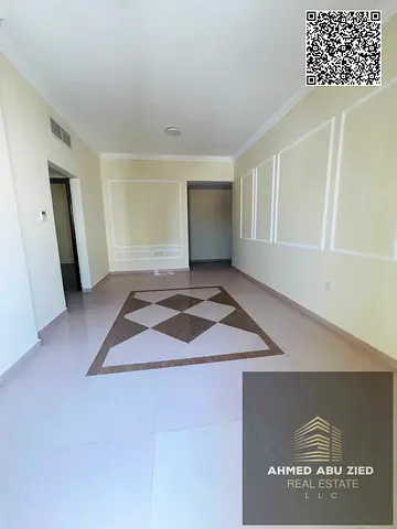 Spacious 2BR Hall for annual rent in Al Hamidiya 1 near Ajman Court; 2 bathrooms, balcony with open view; yearly rent AED 35,000 in 4 payments, prime