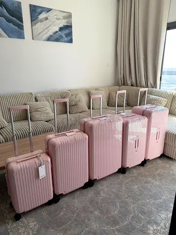 Set of 4 Pink Hard-Shell Suitcases with Telescopic Handles