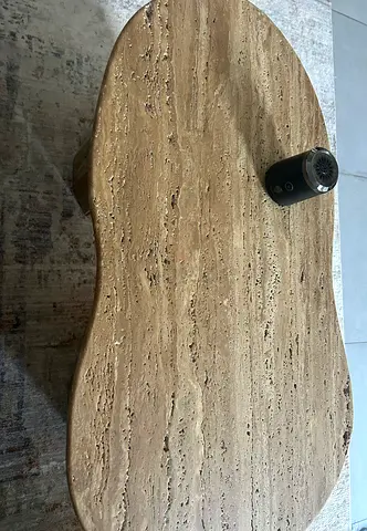 Natural travertine kidney-shaped coffee table - solid stone top