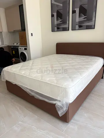 Queen bed frame and mattress (NEW)