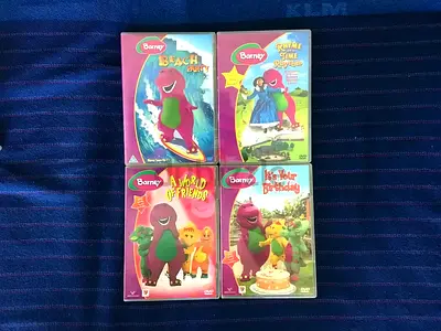 4 Barney DVDs (ENGLISH/ARABIC-DUBBED)