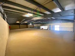 Warehouse for annual rent in Al Sajaa Industrial Area Ground floor plus mezzanine Huge space Fully e