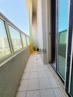 1 Bedroom Hall with balcony// front on Muwailah bus Station// no deposit Cash