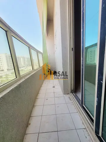 1 Bedroom Hall with balcony// front on Muwailah bus Station// no deposit Cash