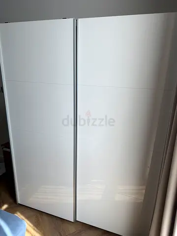 White modern 2-door wardrobe / armoire - good condition
