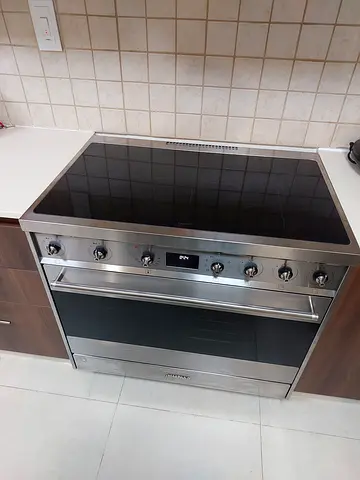 Smeg induction cooker Stainless and Large Electric Oven - Good Condition